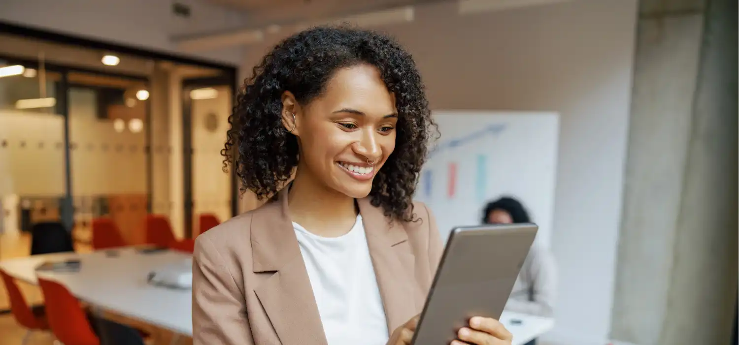 young professional engaged deeply with tablet within modern office environment 1